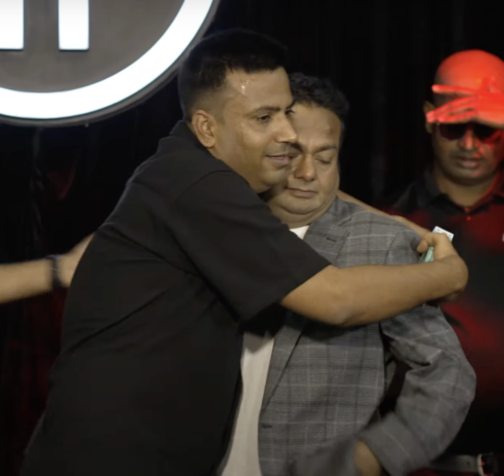 deepak and punnet hugging each other